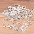 Mixed set of antique silver alloy charms including stars, crosses, and hearts for DIY jewelry - Mixed Styles (30-45 Types) / 100g Pack / Antique Silver