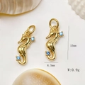 Detailed macro view of gold seahorse pendants with blue zircon and size dimensions - Gold Seahorse Pendant Only (Without Chain) (25110216)
