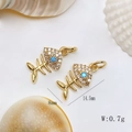Macro detail of gold fishbone charms with micro-pave zircons and blue gemstone eyes - Gold Fishbone Pendant Only (Without Chain) (25110216)