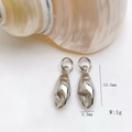 Detailed view of silver shell pendants with dimensions 13.5mm height and 5.5mm width - Silver Crab Claw Pendant Only (Without Chain) (25110216)