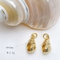 Macro detail of gold conch charms with textured surface, 6x12mm size and 1.1g weight - Gold Conch Pendant Only (Without Chain) (25110216)