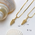 Detailed view of conch shell pendant measuring 15mm by 5mm in gold finish - Gold Spiral Shell Necklace (25110216)