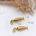 Detail view of 14x4mm golden fish pendants with scales on white conch shell - Gold Small Fish Engraved Pendant Only (Without Chain) (25110216)