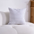 Modern square throw pillow cover with black and white horizontal stripes on sofa - White Bold Stripe Cushion Cover