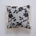 Square jacquard throw pillow with black and white floral pattern and cream cotton tassels - Jacquard Black Rose with White Tassel