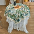 Round floral jacquard tablecloth with tassel fringe layered over white lace fabric - Jacquard Green Lotus Style (Curved Tassel)