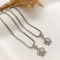 Silver marine turtle pendant necklaces with zircon inlay on a white ocean background - Silver Turtle Necklace (25110216)