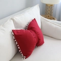 Red bow-shaped decorative pillow with white pom-pom trim for sofa decor - Wine Red / 43x55cm
