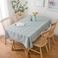 Nappe en lin bleu gris avec broderies blanches verticales sur table en bois - 60*60cm / Gris