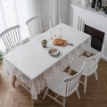 Elegant white lace tablecloth with floral patterns on a wooden dining table - 145x145 / White