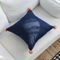 Navy blue linen throw pillow with bright orange corner pom-poms for modern home decor - 45x45cm / Navy Blue with Orange Pom-poms