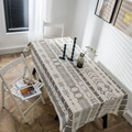 Bohemian geometric printed tablecloth in cream and brown on a wooden dining table - Linen Arrowheads Without Lace. / 100*140cm