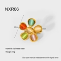Detailed view of 35mm stainless steel flower ring with colorful cat eye stone petals - Hammered Flower Ring (NXR06)
