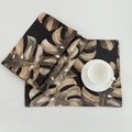 Tropical monstera leaf print table mat in coffee and brown tones with ceramic coffee cup - Coffee Leaf Pattern