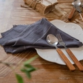 Deep grey washed cotton placemat with white zigzag stitching and frayed edges on wood - 40x60cm / Gray