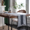 Gray striped woven cotton table runner with handmade tassels on a walnut wood table - Center Gray / 30-50 (including Tassels)