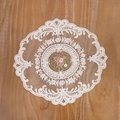 Close-up of vintage lace table mat featuring delicate floral embroidery and scalloped edges - 29*29 / White