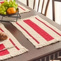 Woven dining placemat with bold red stripes and tassels on dark wood table - Bright Red Three-Stripe White Fringe Placemat