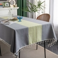 Modern rectangle tablecloth in charcoal grey with yellow stripes and white tassel fringe - Gray-green Braided Rice Broom Tablecloth In The Middle / 140-260