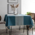 Navy blue cotton linen tablecloth featuring ethnic white patterns and elegant tassels - In The Middle There's A Braided Rice Broom And Tablecloth. / 140-260