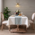 Elegant cream tablecloth featuring sage green houndstooth pattern and white fringe tassels - The Small Green Square In The Middle Is A Rice Broom Tablecloth. / Custom Size