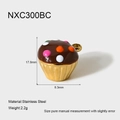 Detailed macro view of 18k gold-plated stainless steel cupcake pendant charm - Chocolate Dot Cupcake (NXC300BC)