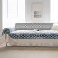 Blue and white floral sofa cover with cream ruffles in a bright home interior setting - Custom Size / Classic Pattern Ruffle
