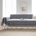 Grey geometric diamond print sofa cover with elegant white ruffled hem for home decor - Black Carpet Geometric Ruffle