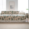 Beige slipcover with green pine needle print and white ruffled edge decoration - Green Pinecone Ruffle