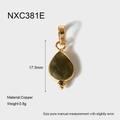 Detail of teardrop faceted green gemstone pendant in copper frame with gold finish - Medium / Dark Green Transparent Style (NXC381E)