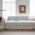 Diamond printed sofa cover with ruffled edges in cream and navy blue stripe pattern - Blue EKG Ruffle