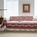 Floral sofa cover with red botanical print and ruffled beige skirt detail - Orange Bird Ruffle