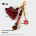 Detailed size specifications for gold-plated stainless steel evil eye bag charm - Nx02