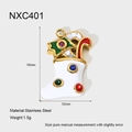 Detail of 18K gold plated Christmas stocking pendant with stars, candy canes and crystals - White Christmas Stocking Style (NXC401)