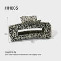 Detail of dalmatian print rectangle hair claw clip showing 10cm size and 5cm height specs - Large Rectangular Spotted Style (HH005)