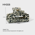 Close-up of a small square hair claw clip with black spotted pattern, size 4.25cm by 2.7cm - Mini Rectangular Spotted Clip (HH008)