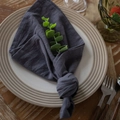 Dark grey washed cotton table napkin tied in a knot on a ceramic dinner plate - 40*60cm / Gray Washed Cotton