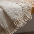 Beige waffle weave curtain with tassels on a wooden surface in a cozy home setting - 140*220cm / Beige White - Rod Pocket