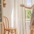 Beige semi-sheer curtain with diamond weave pattern and elegant tassel trim on the edge - Large Hollow Stripe / Size 140-260 / Off White / Grommet Style