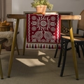 Red table runner with white floral jacquard pattern and colorful tassels on ends - European Floral Red