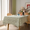 Linen cotton tablecloth featuring green geometric leaf patterns in a Nordic dining setting - 60x60cm / Green Barley (Without Lace)