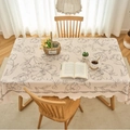 Rectangle cream tablecloth with black floral print and scalloped edges for dining table - 100-140 / Black Line Iris