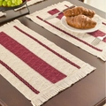 Striped woven place mat in beige and burgundy with fringe detail on a wooden table - Burgundy Triple Stripe White Tassel