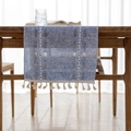 Blue linen table runner with white geometric embroidery and tassel fringe decor - Indigo