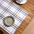 Nordic grey and white checkered linen table napkin displayed on a rustic wooden table - Grey White Plaid Single Layer Napkin