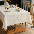 Creamy rectangular tablecloth featuring yellow floral embroidery and beige tassels - Yellow Pumpkin Flower Embroidery (Zhong Jian Xiu Hua Huang Se Nan Gua Hua Mi Sao Ba) / 100cmx140cm