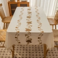 Rectangular cream tablecloth with brown floral embroidery and fringe trim on wood table - Coffee Rose Style / 140x100CM