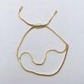 Detail view of 18k gold plated box chain bracelet with adjustable slider clasp feature - Standard Base Bracelet / Gold