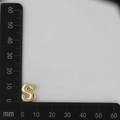 Macro shot of a polished golden 12mm 18k copper letter S pendant with measuring ruler - Letter S Pendant Only (Without Chain) / Gold