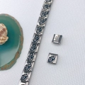 Detailed close-up of retro rose embossed stainless steel modular charm bracelet links - Vintage Rose Styles (21 Designs)